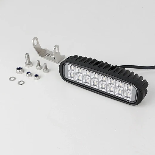 Side view of the work lamp showing the 360 degree adjustable stud mount