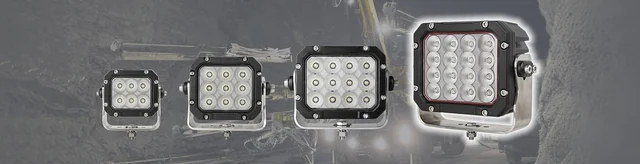 Four square Sunlitec LED work lights mounted across a vehicle bumper