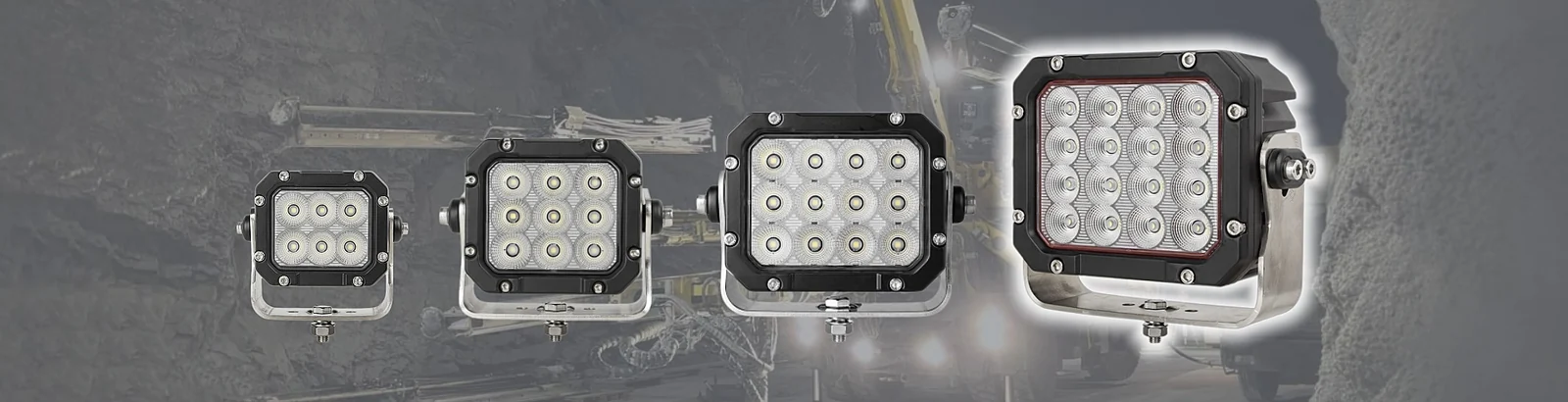 Four square Sunlitec LED work lights mounted across a vehicle bumper