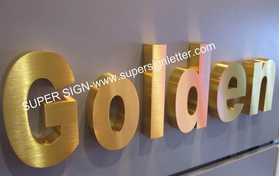 golden brushed steel letters