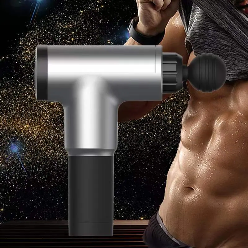 Percussion massage gun held over a shoulder during recovery
