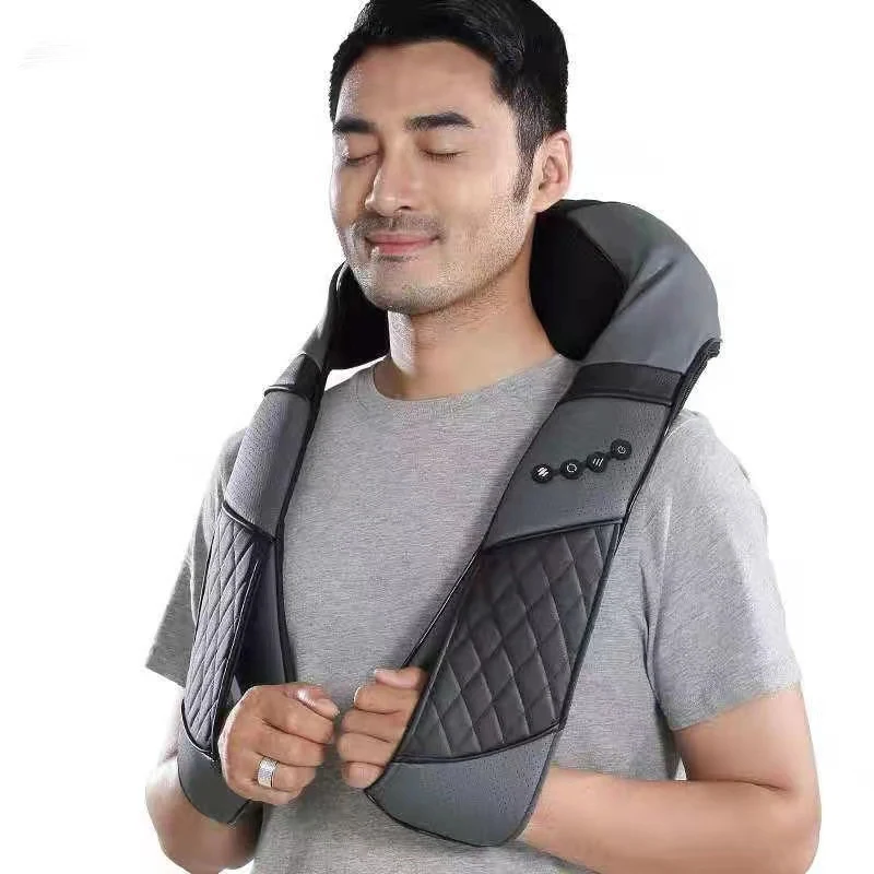Man wearing a neck and shoulder roller massager