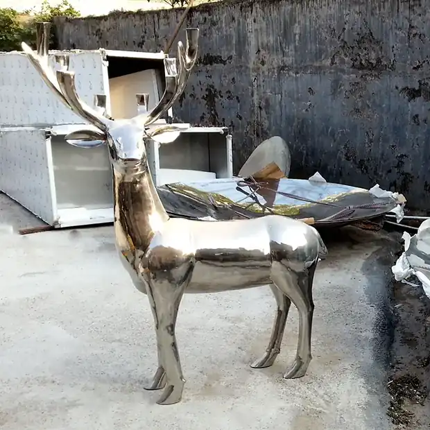 Close-up of the natural polished surface of a stainless steel Sika deer sculpture