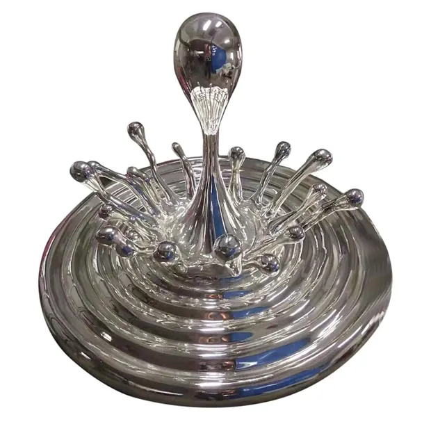 Stainless steel water sculpture installed in a shopping mall atrium