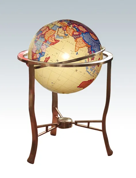 Mirror polished stainless steel globe floating within a transparent outer shell