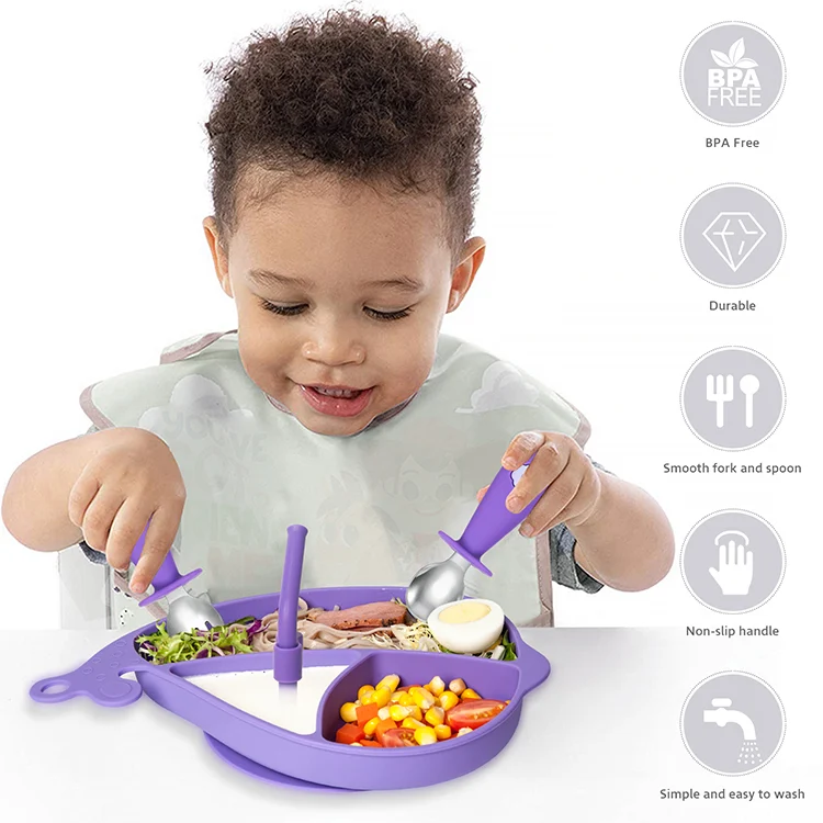 Set displayed in a clean, bright setting with a baby bib and cup nearby