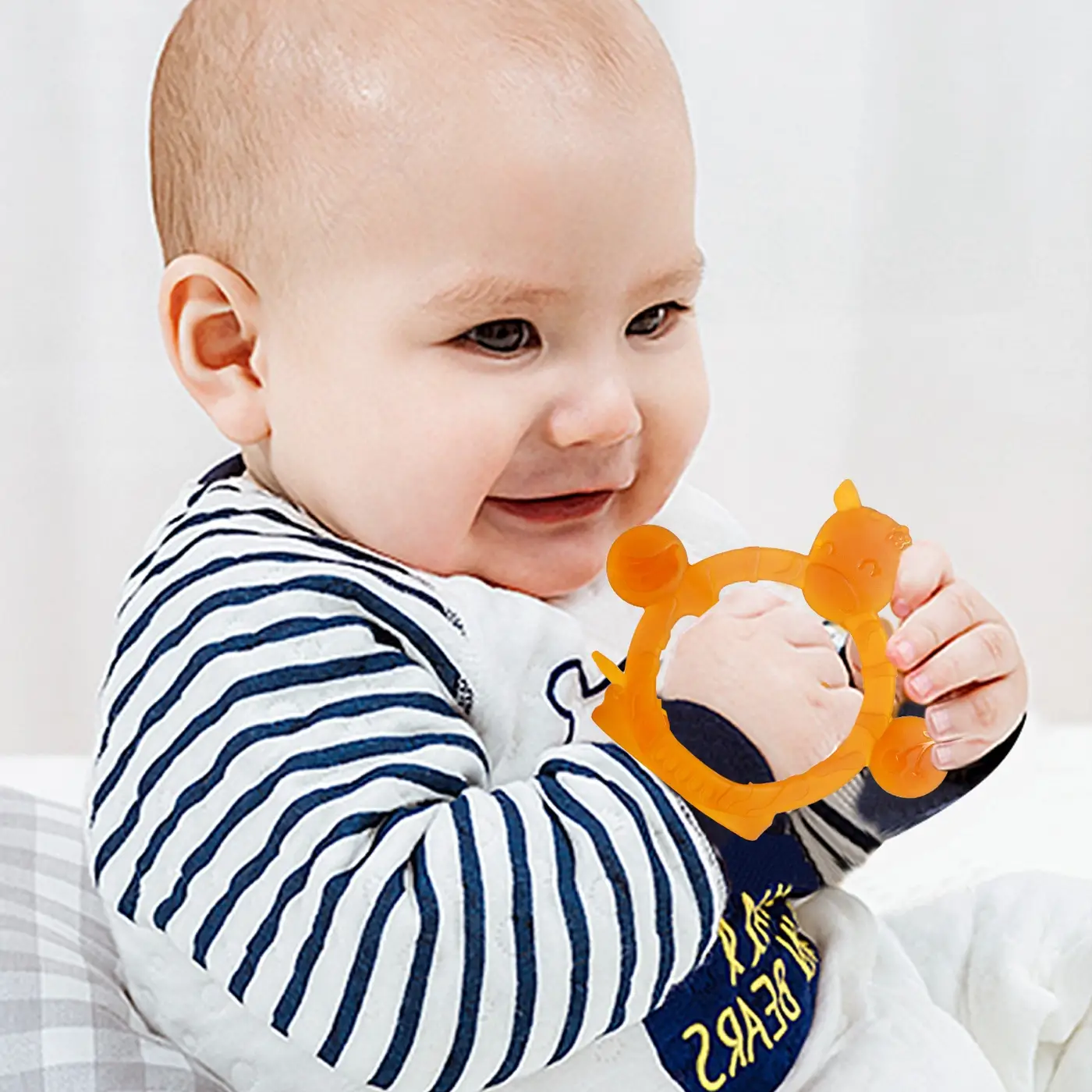 Teether in a small pocket, demonstrating compact size