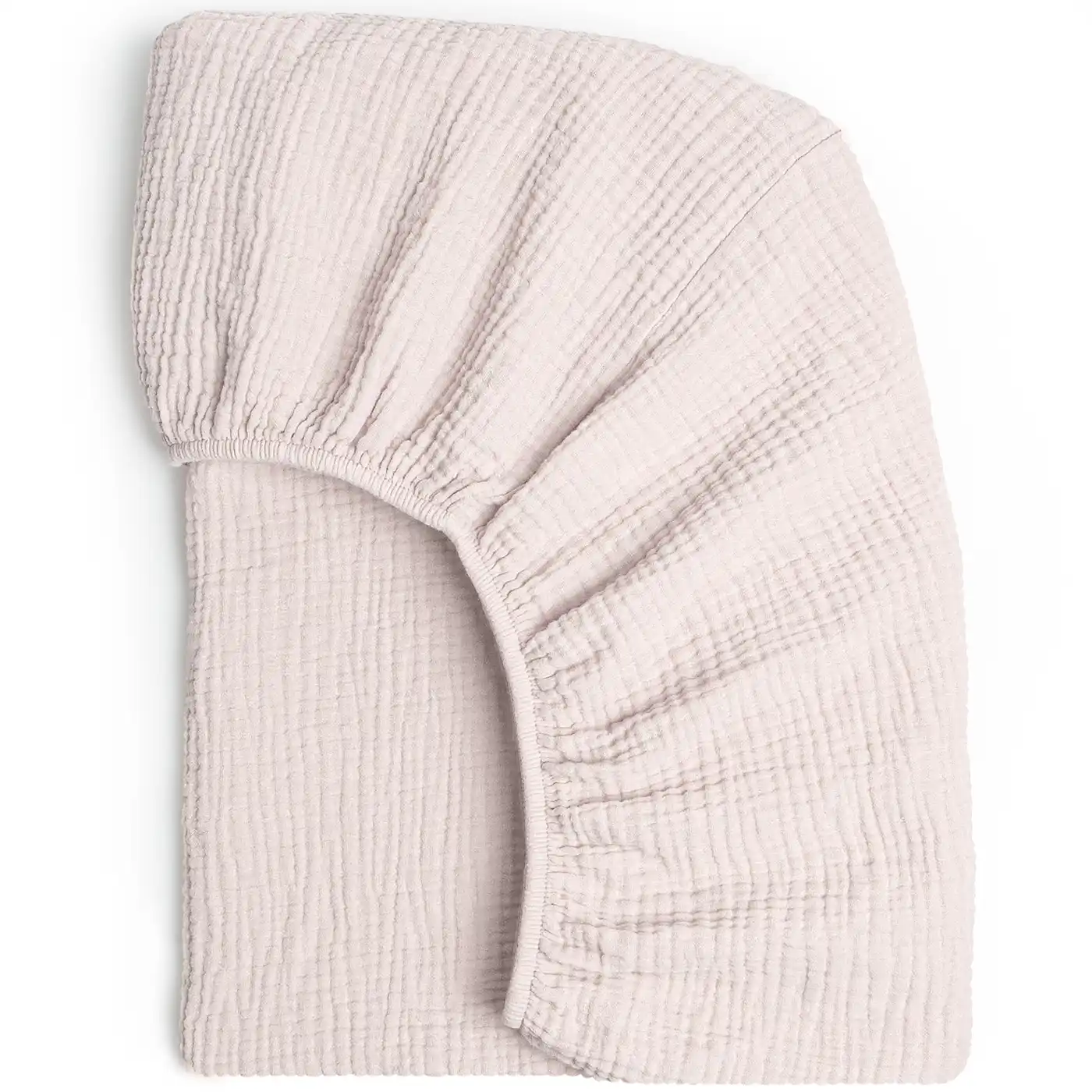 Light pink 28x52 fitted crib sheet with elastic band visible on the edge