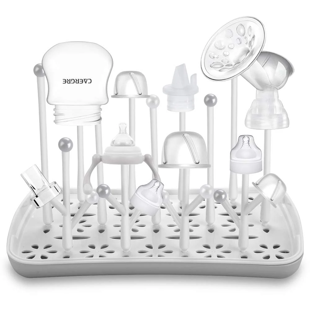 Drying rack with bottles and teats placed on the surface