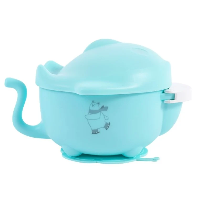 Stainless steel baby food bowl with suction base, white lid, on a table