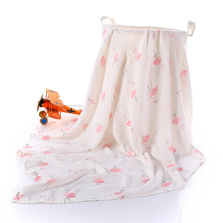 Pink bamboo cotton swaddle blanket laid flat, 120*110cm