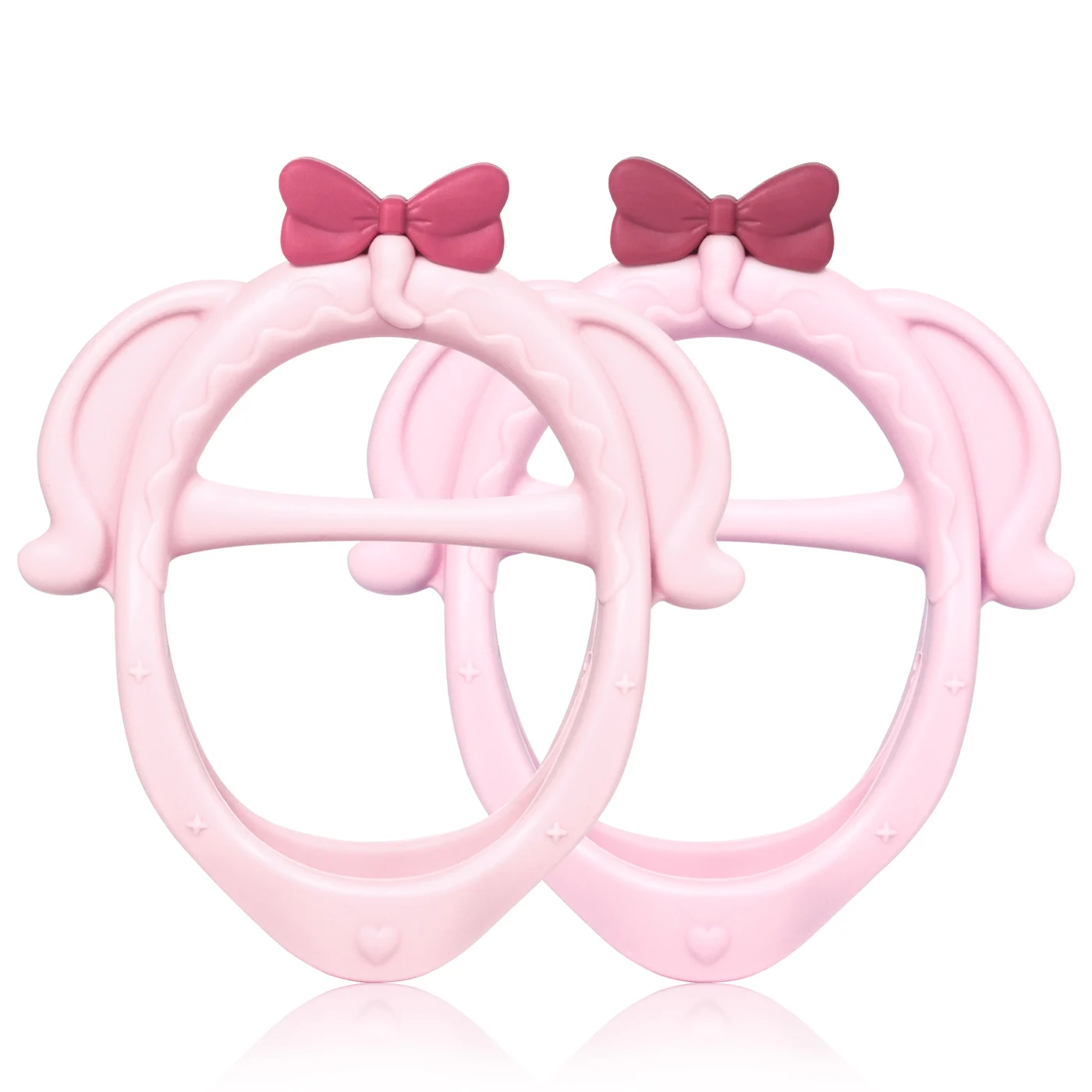 Two pink elephant-shaped silicone baby teethers in a clear PP storage box