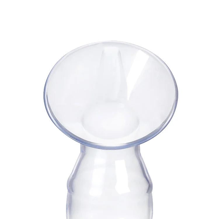 Black silicone breast milk pump standing upright with stopper in place