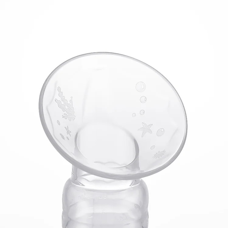 Silicone breast pump with lid removed, revealing the open chamber and suction base