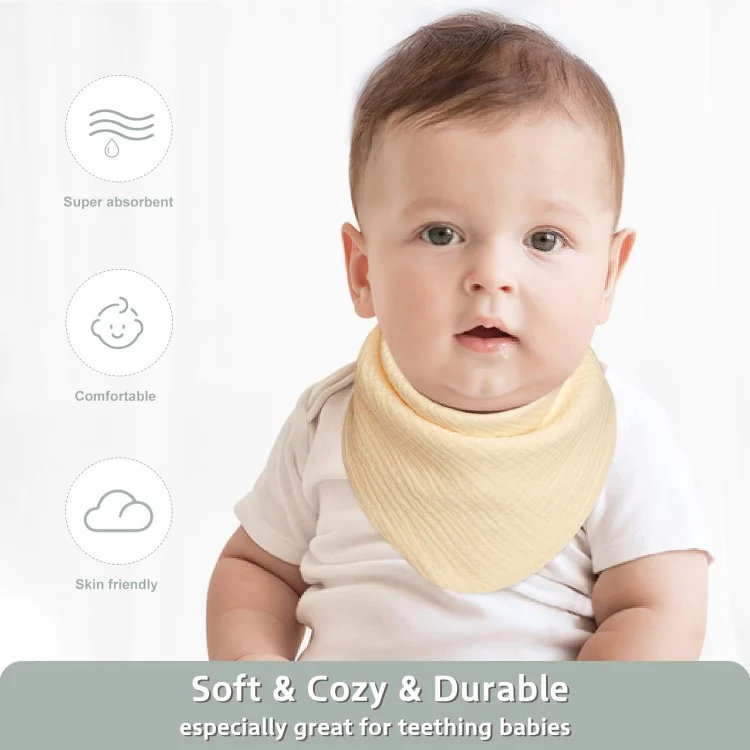 Bib worn by a baby during feeding, showing the bandana style