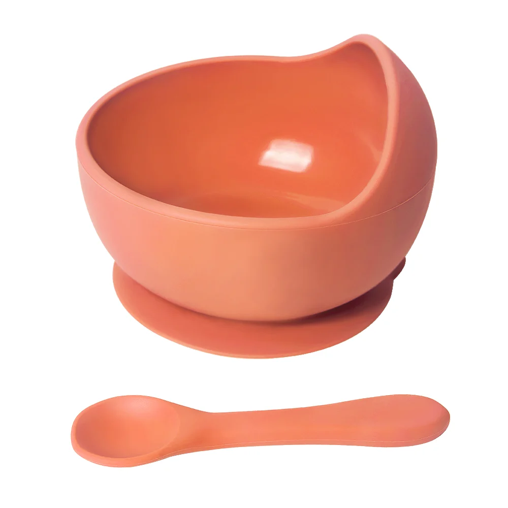 Silicone spoon detached from the bowl, showing soft texture