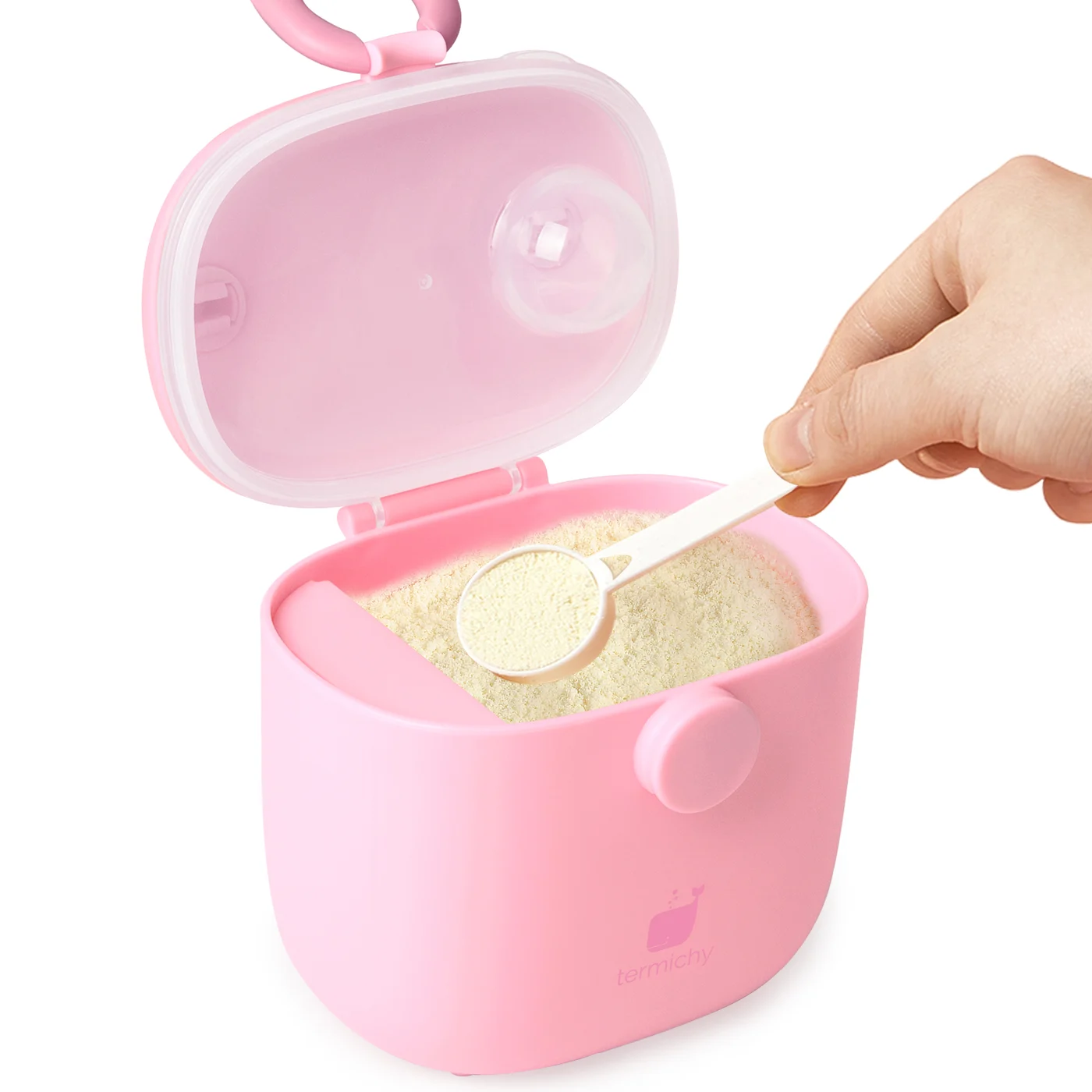 Formula dispenser placed inside a nappy bag for travel use