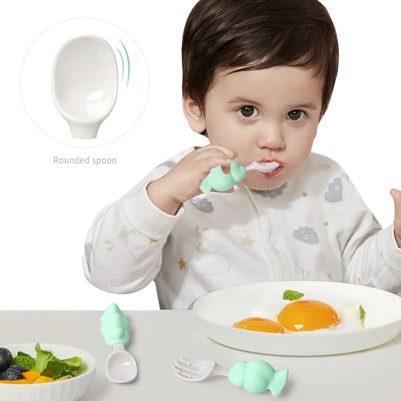 Baby spoon and fork set placed inside the PP storage box