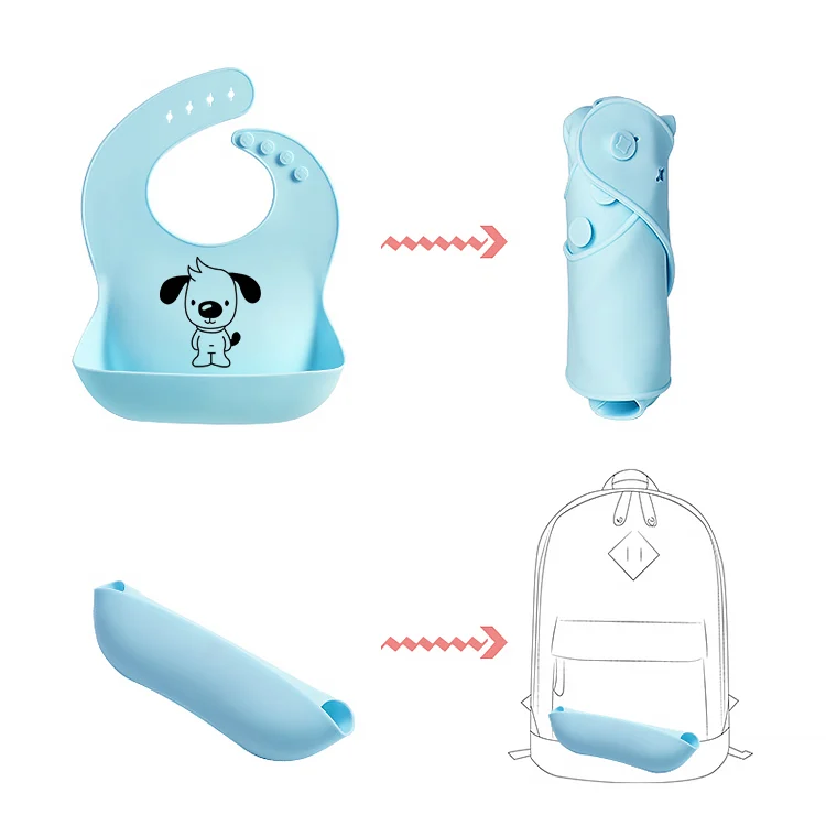 Silicone bib rolled up and stored in a nappy bag