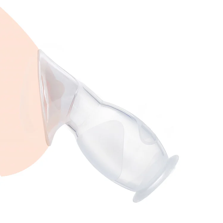 Breast pump in a pink colour variant, sitting on a clean surface