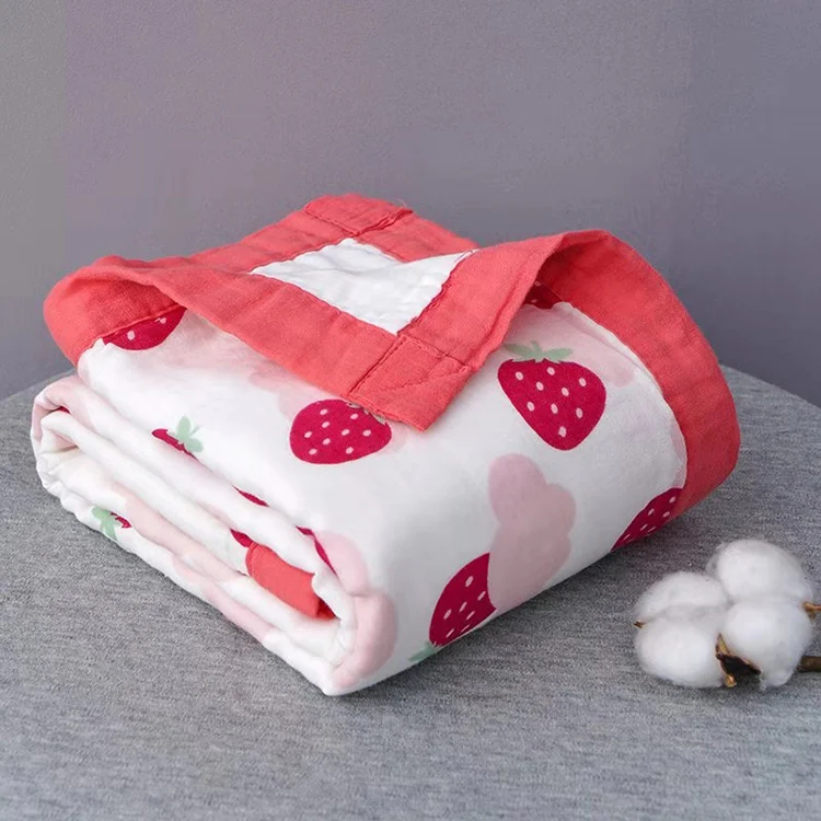 Baby blanket with a baby wrapped in it for swaddling