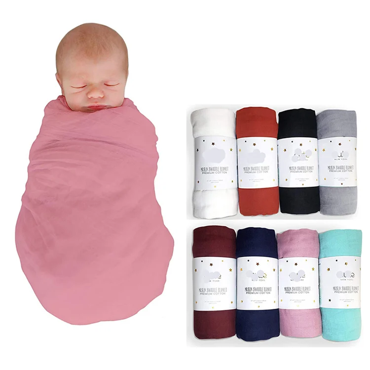 Blue 47x47 inch cotton bamboo muslin swaddle blanket with adjustable bow headband