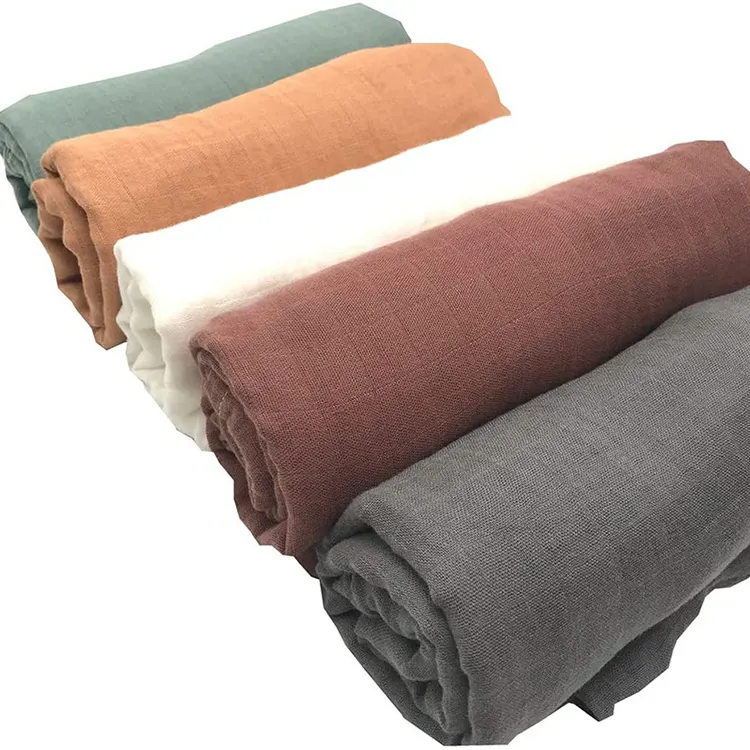 Swaddle blanket used as a nursing cover with baby and headband
