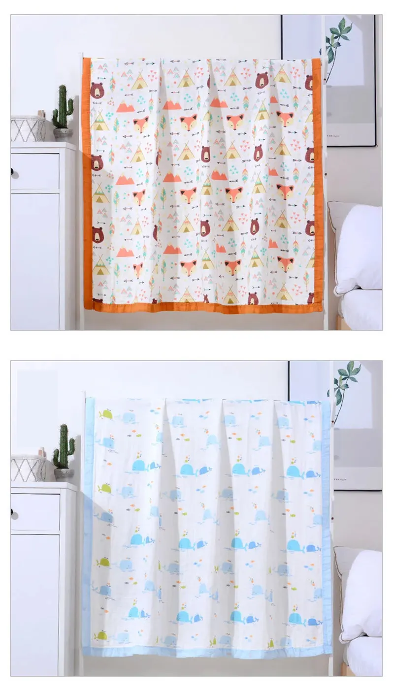 Green 4-layer swaddle blanket with plant and leaf pattern, folded in a corner