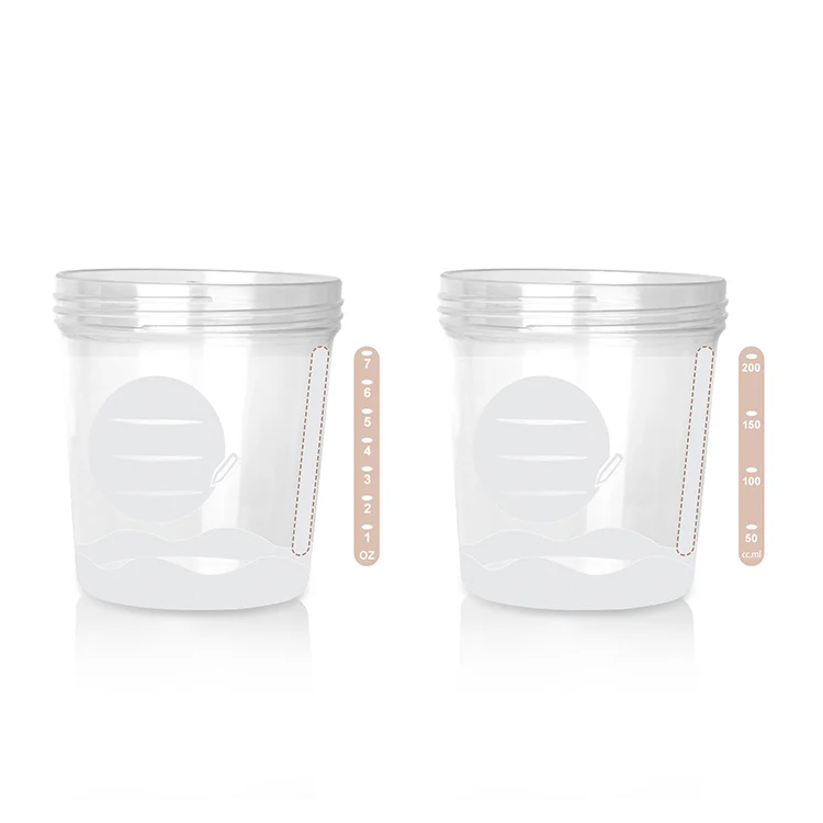 Pink baby food storage container with lid screwed on, showing the seal