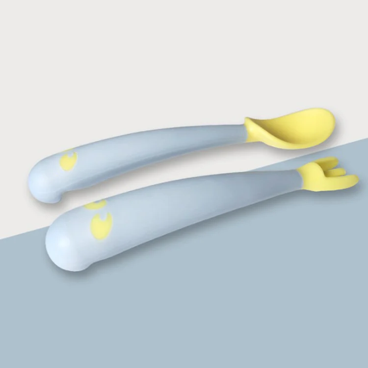 Spoon and fork laid out with the storage box open