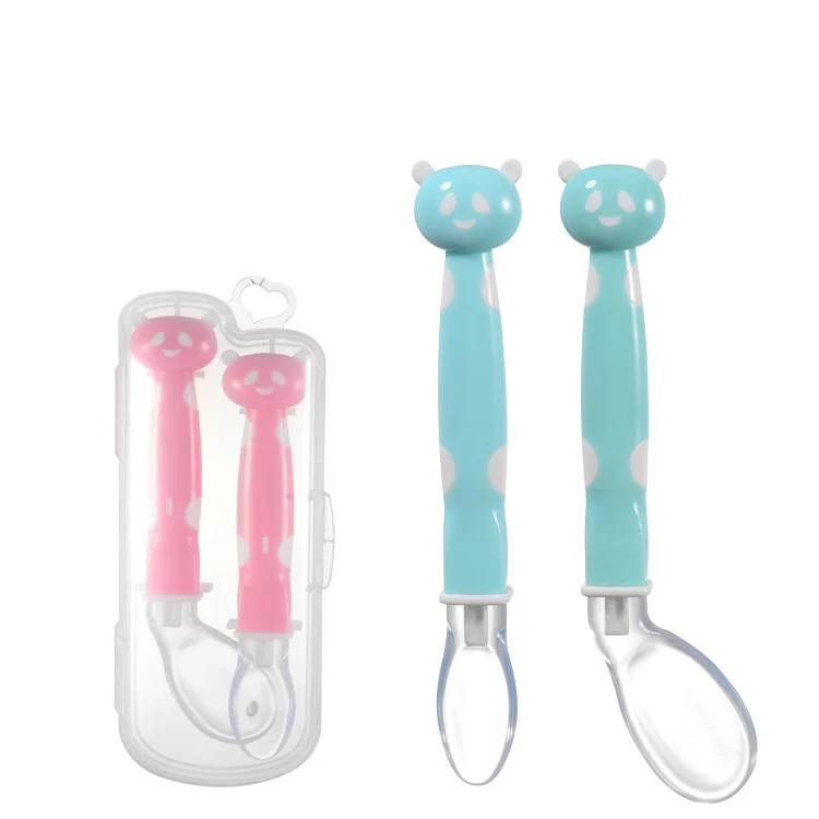 Panda spoon with handle detail and soft silicone head in natural light