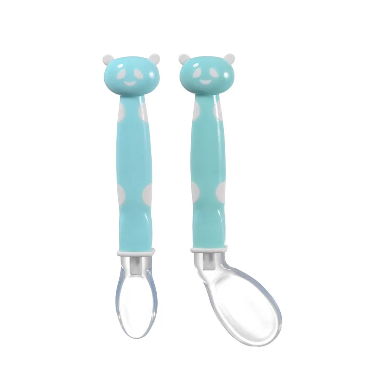 Side view of a panda feeding spoon showing the soft silicone head and non-slip handle