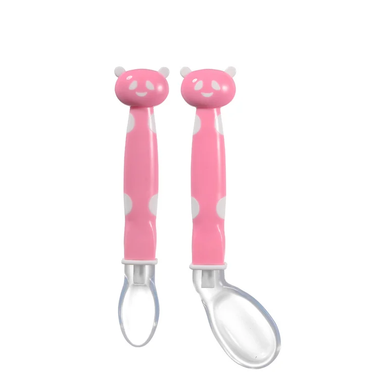 Close-up of the soft silicone spoon tip and rounded edge designed for baby gums