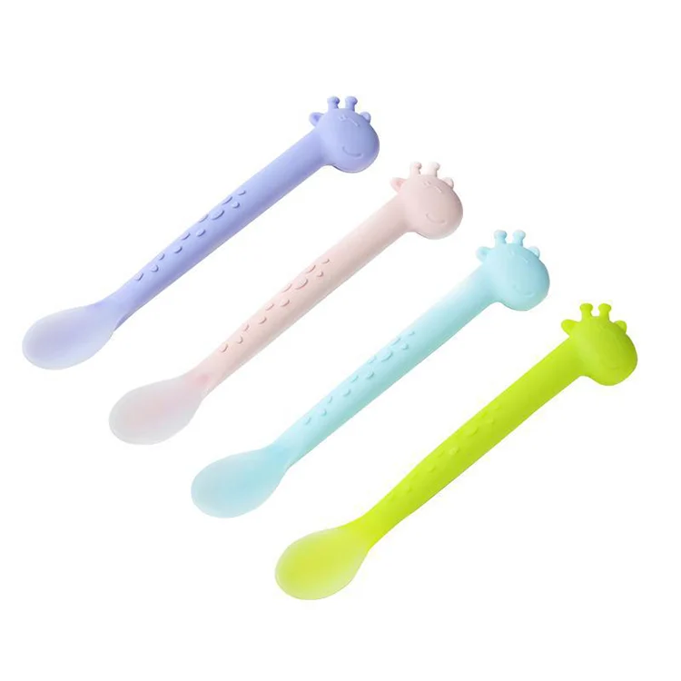Feeding spoon in white, showing smooth surface and soft material