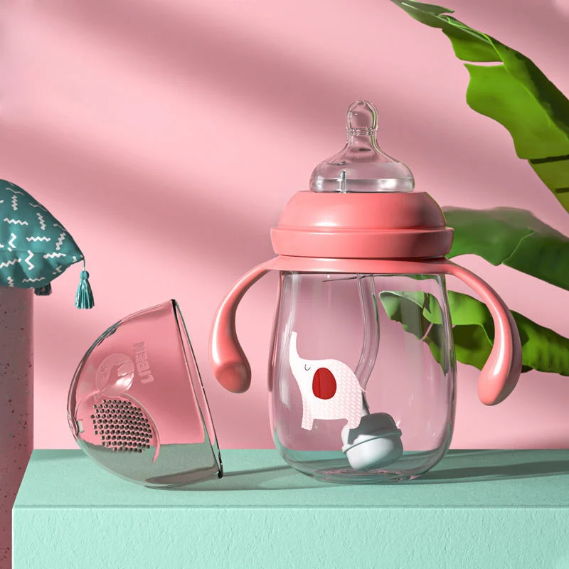 Green baby feeding bottle with rotating handle, showing the 360-degree straw group