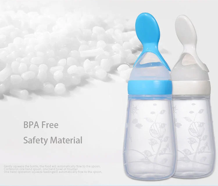 White silicone squeeze feeder with spoon removed, showing the bottle body and sealing disc