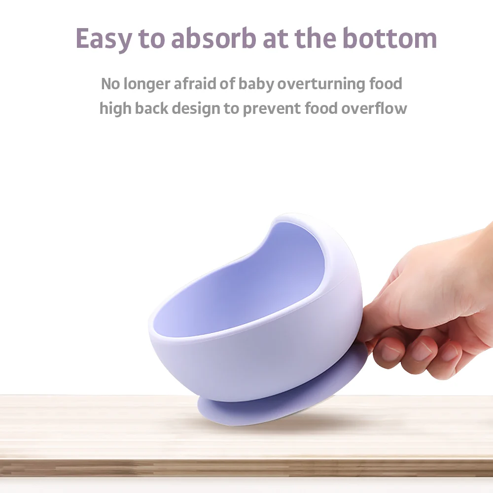 Red silicone bowl with spoon, side view showing thickness