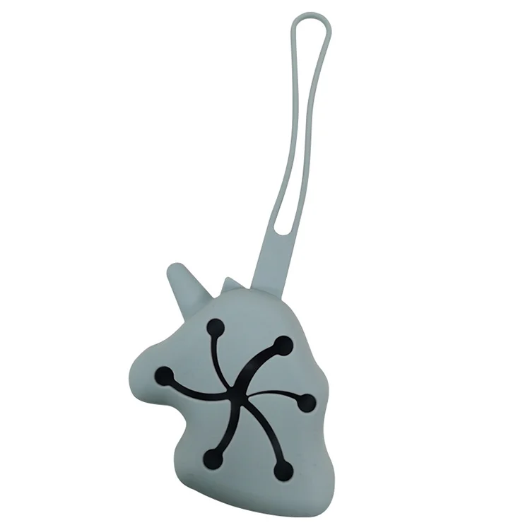 Blue unicorn-shaped pacifier holder standing upright with strap extended