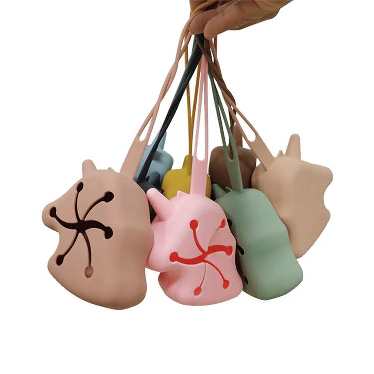 Pacifier holder laid flat with the strap folded back