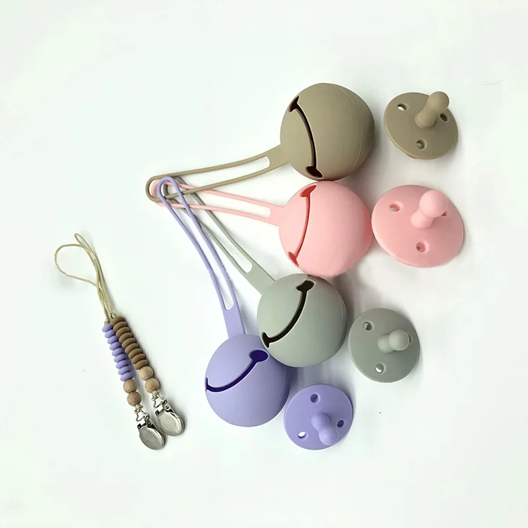 Silicone pacifier case in blue with two pacifiers inserted, showing full capacity