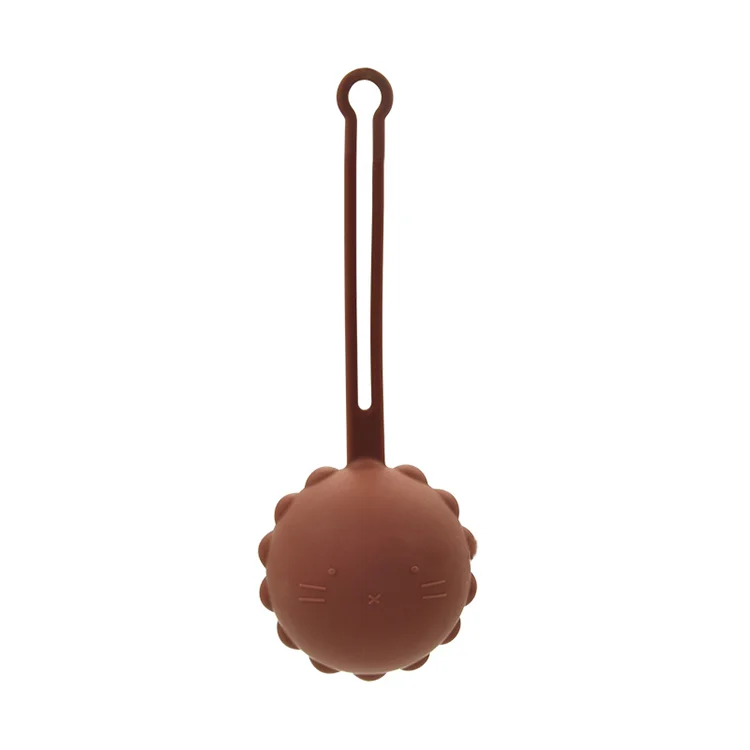 Close-up of the open end of the silicone holder with a pacifier inside