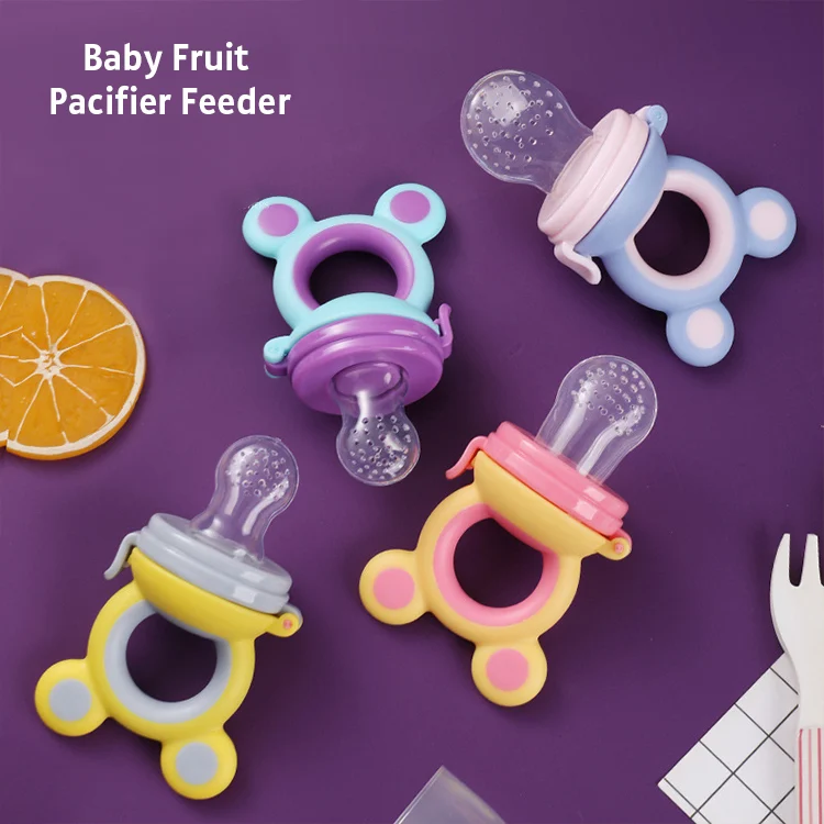 Pacifier in use during self-feeding, showing grip and feeding action