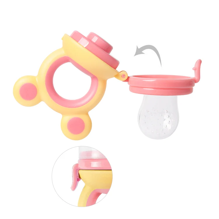 Baby feeding pacifier with the S-sized nipple attached, held in hand