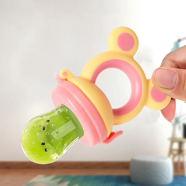 Pacifier with the M-sized nipple in use, showing the soft silicone texture