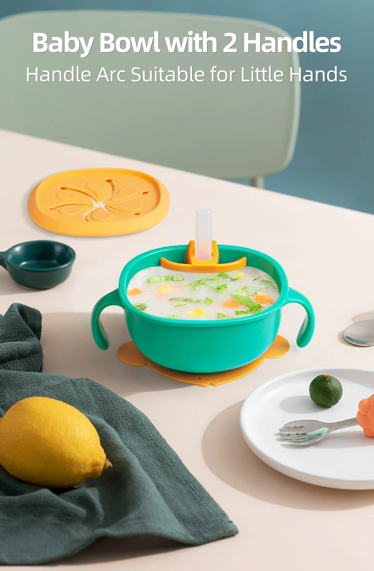 Bowl in use with a baby holding it, demonstrating grip and stability