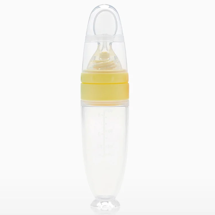 Baby spoon feeder with the lid open, showing the feeding tip and fabric body