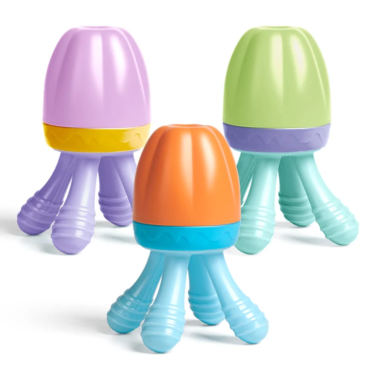 Teething pacifier feeder in white with a soft silicone nipple attached, showing textured surface