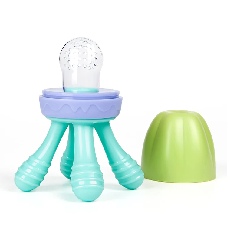 Side view of the feeder with the food pouch filled with puree, highlighting the compact size