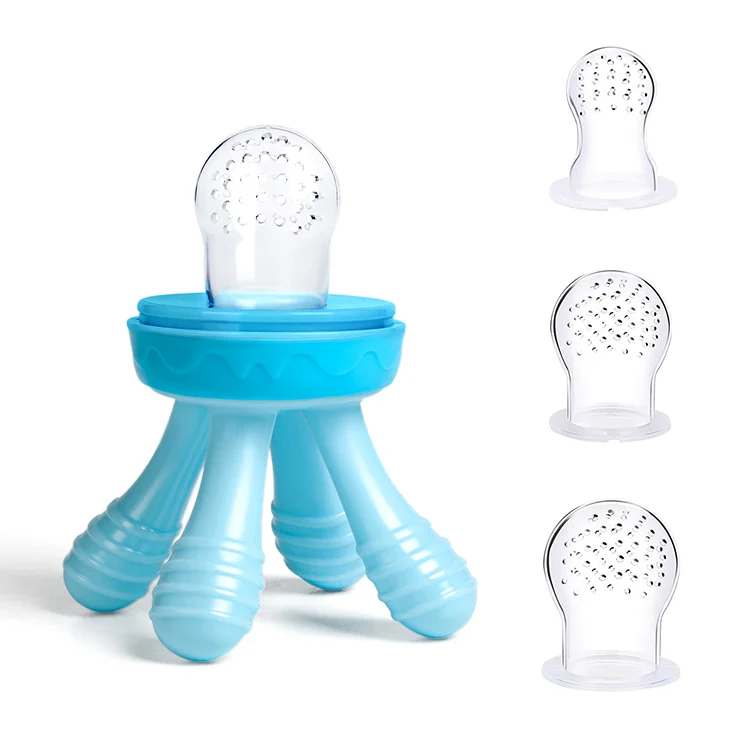 Feeder in use with a baby sucking from the nipple, feeding puree