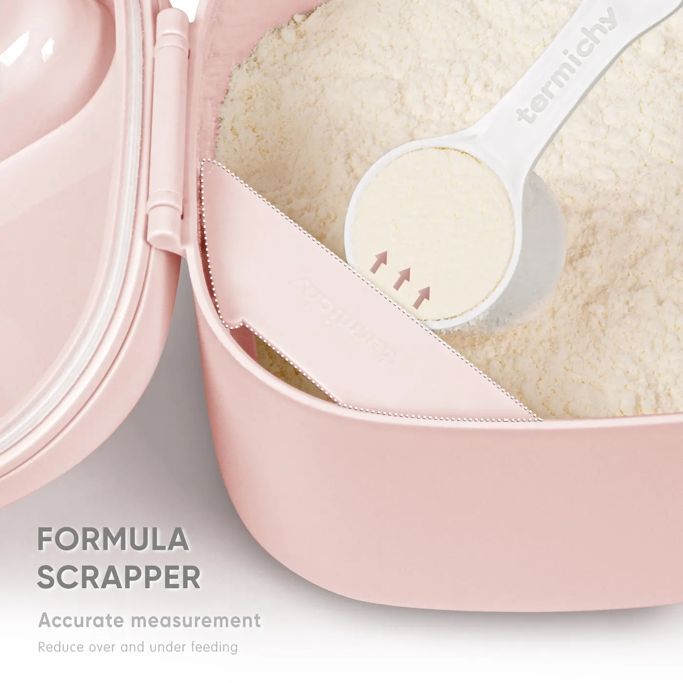 Pink formula dispenser container with the lid open and scoop in place